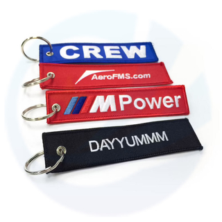 Wholesale Flight Custom Jet Tag Key Chains Fabric Woven Brand Label Woven Custom Logo Key Tag Embroidered Key Ring