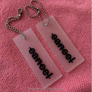 Embossed logo transparent PVC rubber hangtag,rubber swing tag with metal ballchain