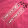 Embossed logo transparent PVC rubber hangtag,rubber swing tag with metal ballchain